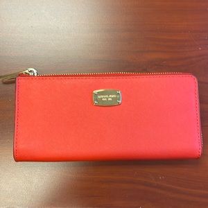 Michael Kors orangish red wallet